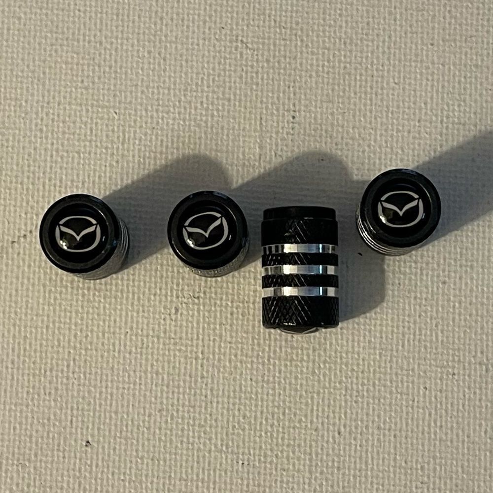 Mazda valve Stem caps in Black set of 4 NWT